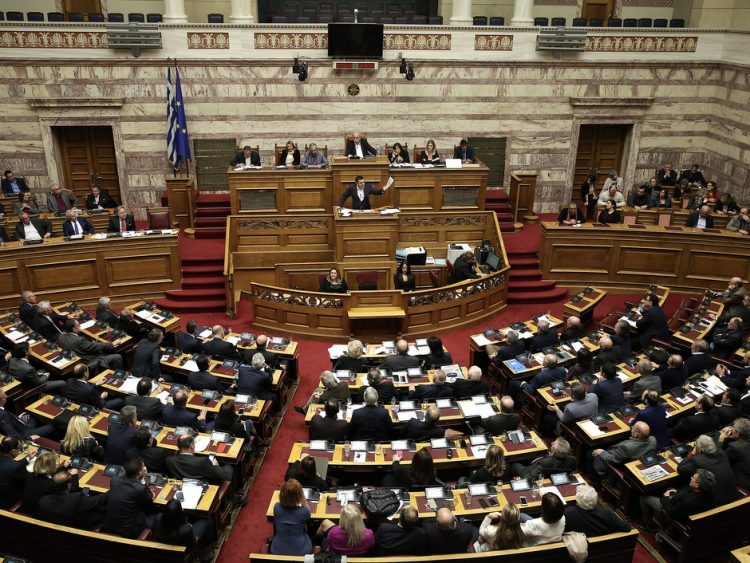 epa07316980 Greek Prime Minister Alexis Tsipras (C) delivers a speech during a debate on the Prespes Agreement in the parliament plenary in Athens, Greece, 24 January 2019. The discussion and processing of the draft law ratifying the name issue agreement signed by Greece and FYROM began on 23 January and will continue until 25 January, when voting will take place.  EPA-EFE/SIMELA PANTZARTZI