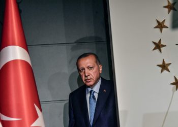 TOPSHOT - Turkish President Recep Tayyip Erdogan arrives to deliver a speech on June 24, 2018 in Istanbul, after initial results of Turkey's presidential and parliamentary elections. 
Erdogan on June 24 declared victory in a tightly-contested presidential election, extending his 15-year grip on power in the face of a revitalised opposition. Turkish voters had for the first time cast ballots for both president and parliament in the snap polls, with Erdogan looking for a first round knockout and an overall majority for his ruling Justice and Development Party (AKP). / AFP PHOTO / BULENT KILICBULENT KILIC/AFP/Getty Images