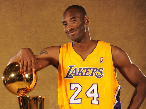 EL SEGUNDO, CA - SEPTEMBER 25:  Kobe Bryant #24 of the Los Angeles Lakers poses with the Larry O'Brien trophy at Media Day at Toyota Sports Center on September 25, 2010 in El Segundo, California. NOTE TO USER: User expressly acknowledges and agrees that, by downloading and/or using this Photograph, user is consenting to the terms and conditions of the Getty Images License Agreement. Mandatory Copyright Notice: Copyright 2010 NBAE (Photo by Andrew D. Bernstein/NBAE via Getty Images) *** Local Caption *** Kobe Bryant