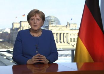 This videograb taken from German TV channel ARD on March 18, 2020 shows German Chancellor Angela Merkel addressing the nation on the spread of the new coronavirus COVID-19 at the Chancellery, with a view in the background of the Reichstag, the building housing the lower house of parliament. - Germany is facing its biggest challenge "since the Second World War" in the fight against the coronavirus pandemic, Chancellor Angela Merkel said in a television address urging citizens to heed sweeping confinement measures. (Photo by Uta TOCHTERMANN / AFP)
