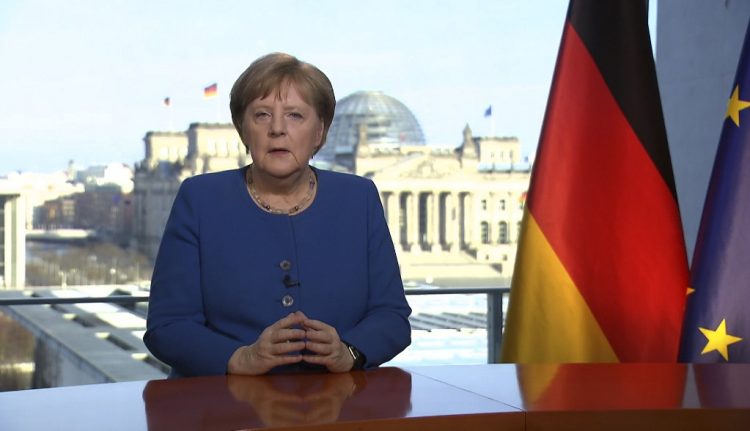 This videograb taken from German TV channel ARD on March 18, 2020 shows German Chancellor Angela Merkel addressing the nation on the spread of the new coronavirus COVID-19 at the Chancellery, with a view in the background of the Reichstag, the building housing the lower house of parliament. - Germany is facing its biggest challenge "since the Second World War" in the fight against the coronavirus pandemic, Chancellor Angela Merkel said in a television address urging citizens to heed sweeping confinement measures. (Photo by Uta TOCHTERMANN / AFP)