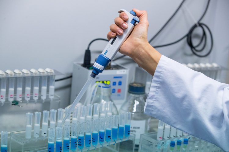A lab worker prepares solutions for the manufacture of coronavirus diagnostic test kits at the TIB Molbiol Syntheselabor GmbH production facility in Berlin, Germany, on Thursday, March 6, 2020. TIB has reoriented its business toward coronavirus, running its machines through the night and on weekends to make the kits, which sell for about 160 ($180) apiece. Photographer: Krisztian Bocsi/Bloomberg via Getty Images