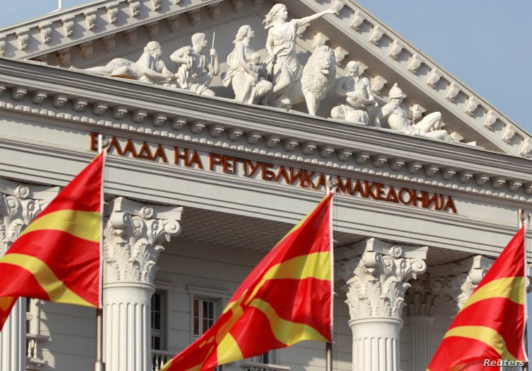 National Macedonian flags flutter in front of the government building in Skopje, Macedonia June 12, 2018. REUTERS/Ognen Teofilovski - RC15016A3360