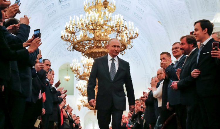 Russian President Vladimir Putin walks before an inauguration ceremony at the Kremlin in Moscow, Russia May 7, 2018. Alexander Zemlianichenko/Pool via REUTERS     TPX IMAGES OF THE DAY - RC1FC92C63D0
