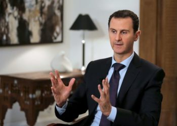 TOPSHOT - Syrian President Bashar al-Assad gestures during an exclusive interview with AFP in the capital Damascus on February 11, 2016.  / AFP / JOSEPH EID        (Photo credit should read JOSEPH EID/AFP/Getty Images)