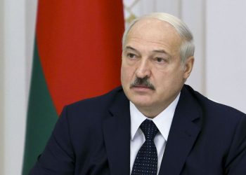 Belarusian President Alexander Lukashenko speaks during a meeting with officials in Minsk, Belarus, Thursday, Aug. 27, 2020. Russian President Vladimir Putin says that his Belarusian counterpart has asked him to provide security assistance to help stabilize the situation in the country if needed, adding that there is no such need yet. Belarus' authoritarian president, Alexander Lukashenko, is facing weeks of protests against his reelection in the Aug. 9 vote, which the opposition say was rigged. (Sergei Sheleg, BelTA Pool via AP)