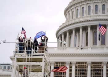 Trump supporters rally Wednesday, Jan. 6, 2021, at the Capitol in Washington. As Congress prepares to affirm President-elect Joe Biden's victory, thousands of people have gathered to show their support for President Donald Trump and his claims of election fraud. (AP Photo/Julio Cortez)