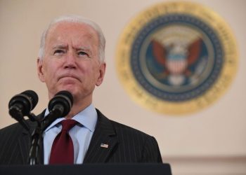 US President Joe Biden speaks about lives lost to Covid after death toll passed 500,000, in the Cross Hall of the White House in Washington, DC, February 22, 2021. (Photo by SAUL LOEB / AFP) (Photo by SAUL LOEB/AFP via Getty Images)