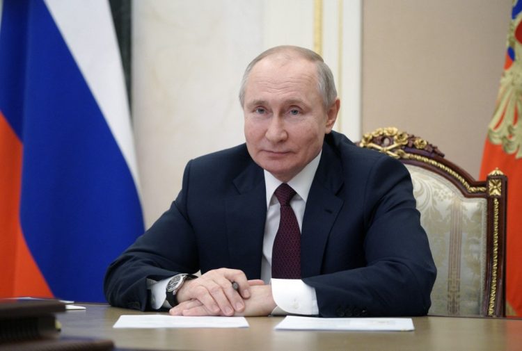Russian President Vladimir Putin meets with members of the public of Crimea via a video link in Moscow on March 18, 2021. (Photo by Alexey DRUZHININ / SPUTNIK / AFP)