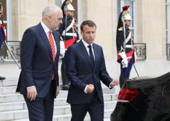 France's President Emmanuel Macron (R) accompanies Albania's Prime Minister Edi Rama leaving the Elysee presidential palace in Paris, on May 15, 2018, after their meeting. (Photo by ludovic MARIN / POOL / AFP)        (Photo credit should read LUDOVIC MARIN/AFP/Getty Images)