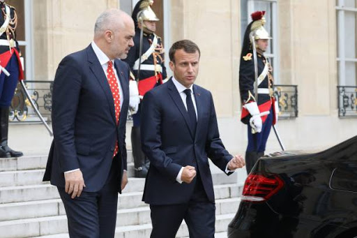France's President Emmanuel Macron (R) accompanies Albania's Prime Minister Edi Rama leaving the Elysee presidential palace in Paris, on May 15, 2018, after their meeting. (Photo by ludovic MARIN / POOL / AFP)        (Photo credit should read LUDOVIC MARIN/AFP/Getty Images)