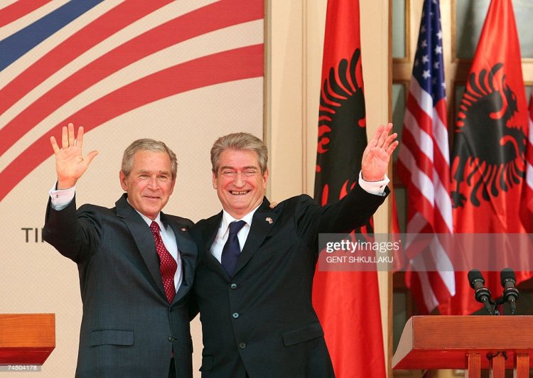 Tirana, ALBANIA: US President George W. Bush (L) and Albanian Prime Minister Sali Berisha wave at the conclusion of a joint press conference 10 June 2007