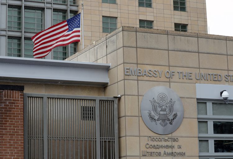 MOSCOW, RUSSIA  MARCH 27, 2018: US national flag waving by the Embassy of the United States of America. The USA has decided to expel 60 Russian diplomats and close the Consulate General of the Russian Federation in Seattle over the poisoning of former Russian military intelligence officer Sergei Skripal and his daughter Yulia in Salisbury, Britain on 4 March 2018. Mikhail Japaridze/TASS (Photo by Mikhail JaparidzeTASS via Getty Images)