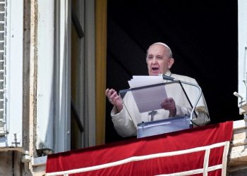 Pope Francis speaks from a window of the apostolic palace overlooking St. Peter's Square in the Vatican during the weekly Angelus prayer followed by the recitation of the Regina Coeli on May 09, 2021. (Photo by Vincenzo PINTO / AFP)
