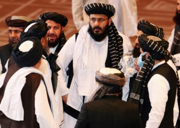 FILE PHOTO: Taliban delegates speak during talks between the Afghan government and Taliban insurgents in Doha, Qatar September 12, 2020. REUTERS/Ibraheem al Omari/File Photo/File Photo