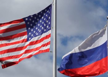 LENINGRAD REGION, RUSSIA - APRIL 12, 2019: Flying American and Russian flags outside the Ford Sollers plant in the town of Vsevolozhsk; a joint Russian-American venture founded by Ford Motor Company and Sollers in 2011, Ford Sollers announced the closure of its three plants in Yelabuga, Naberezhnye Chelny and Vsevolozhsk at the end of March. Alexander Demianchuk/TASS

Ðîññèÿ. Ëåíèíãðàäñêàÿ îáëàñòü. Àìåðèêàíñêèé è ðîññèéñêèé ôëàãè íà òåððèòîðèè çàâîäà Ford Sollers âî Âñåâîëîæñêå. Êîìïàíèÿ Ford Sollers â êîíöå ìàðòà îáúÿâèëà î çàêðûòèè òðåõ çàâîäîâ â ÐÔ: ïðåäïðèÿòèÿ ïî ïðîèçâîäñòâó äâèãàòåëåé â Åëàáóãå è äâà àâòîìîáèëüíûõ çàâîäà â Íàáåðåæíûõ ×åëíàõ è Âñåâîëîæñêå. Àëåêñàíäð Äåìüÿí÷óê/ÒÀÑÑ