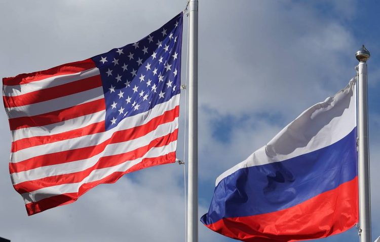 LENINGRAD REGION, RUSSIA - APRIL 12, 2019: Flying American and Russian flags outside the Ford Sollers plant in the town of Vsevolozhsk; a joint Russian-American venture founded by Ford Motor Company and Sollers in 2011, Ford Sollers announced the closure of its three plants in Yelabuga, Naberezhnye Chelny and Vsevolozhsk at the end of March. Alexander Demianchuk/TASS

Ðîññèÿ. Ëåíèíãðàäñêàÿ îáëàñòü. Àìåðèêàíñêèé è ðîññèéñêèé ôëàãè íà òåððèòîðèè çàâîäà Ford Sollers âî Âñåâîëîæñêå. Êîìïàíèÿ Ford Sollers â êîíöå ìàðòà îáúÿâèëà î çàêðûòèè òðåõ çàâîäîâ â ÐÔ: ïðåäïðèÿòèÿ ïî ïðîèçâîäñòâó äâèãàòåëåé â Åëàáóãå è äâà àâòîìîáèëüíûõ çàâîäà â Íàáåðåæíûõ ×åëíàõ è Âñåâîëîæñêå. Àëåêñàíäð Äåìüÿí÷óê/ÒÀÑÑ