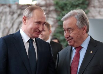 United Nations Secretary-General Antonio Guterres welcomes Russian President Vladimir Putin at the Libya summit in Berlin, Germany, January 19, 2020.  REUTERS/Axel Schmidt