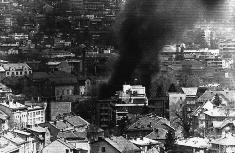 Twenty years ago this week, the Bosnian war began with the siege of Sarajevo, the capital. In this photo, smoke billows from a building in downtown Sarajevo, April 22, 1992, after a Serbian mortar attack.