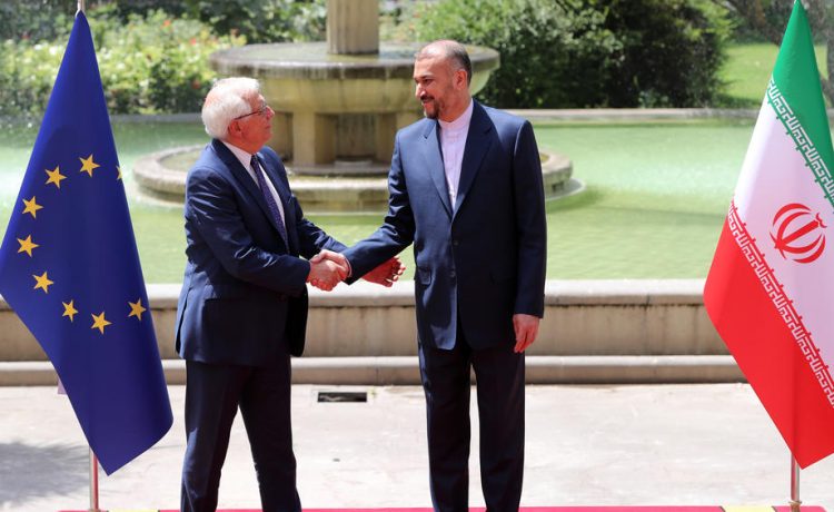 epa10033156 Iranian Foreign Minister Hossein Amir-Abdoulahian (R) welcomes High Representative of the European Union for Foreign Affairs and Security Policy, Josep Borrell (L), in Tehran, Iran, 25 June 2022. Borrell is in Tehran to meet with Iranian officials.  EPA-EFE/ABEDIN TAHERKENAREH