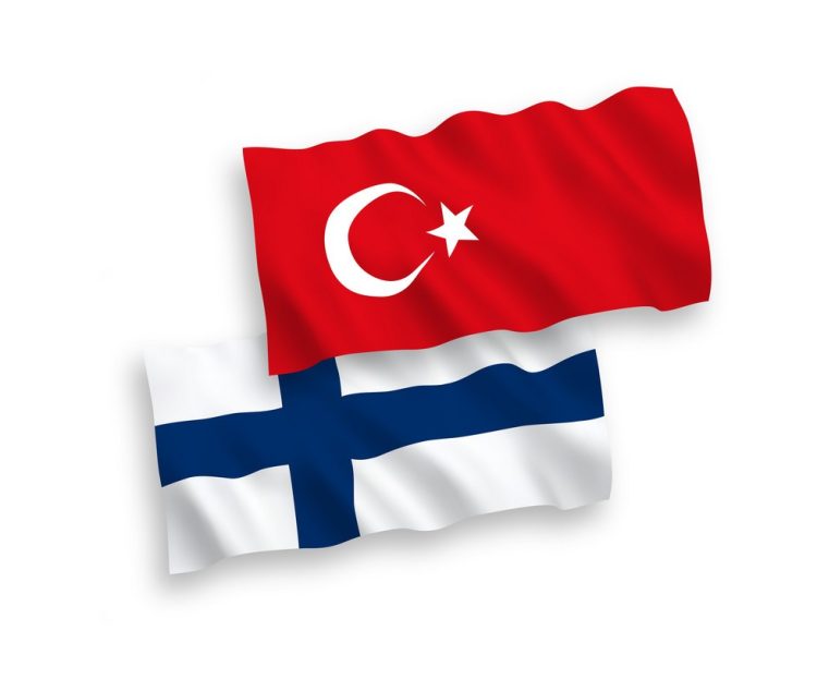National vector fabric wave flags of Turkey and Finland isolated on white background. 1 to 2 proportion.