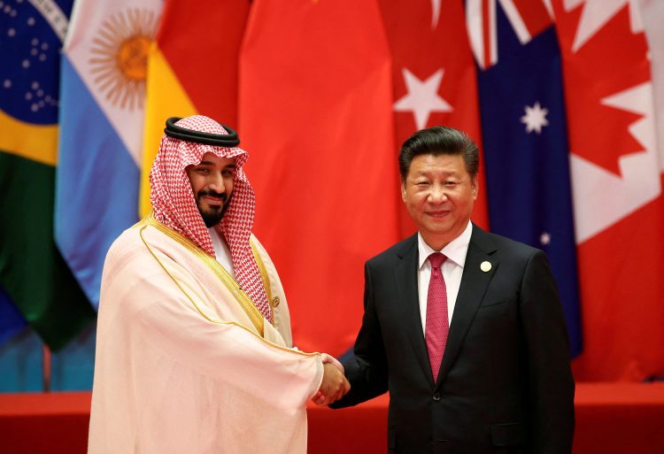 FILE PHOTO: Chinese President Xi Jinping shakes hands with Saudi Arabia's Deputy Crown Prince Mohammed bin Salman during the G20 Summit in Hangzhou, Zhejiang province, China September 4, 2016. REUTERS/Damir Sagolj