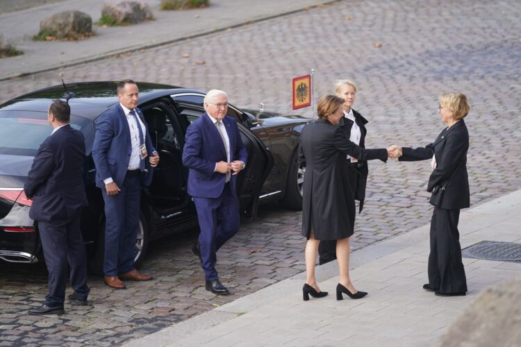 German President Frank-Walter Steinmeier (3rd from left) arrives for the service at Hamburg's main church, Sankt Michaelis. There are a variety of celebrations in the northern German city to mark German Unity Day. Photo: Marcus Brandt/dpa