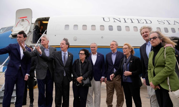 US Senate Majority Leader Chuck Schumer, US Senator Mike Crapo and other members of the delegation arrive at Shanghai Pudong International Airport in Shanghai on October 7, 2023. (Photo by ALY SONG / POOL / AFP)