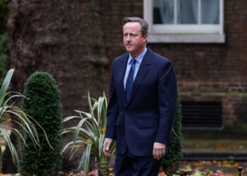 Former British Prime Minister David Cameron walks outside 10 Downing Street in London, Britain November 13, 2023. REUTERS/Suzanne Plunkett