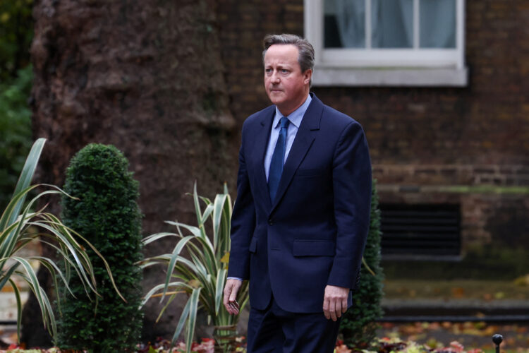 Former British Prime Minister David Cameron walks outside 10 Downing Street in London, Britain November 13, 2023. REUTERS/Suzanne Plunkett