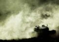 FILED - 02 October 2013, Lower Saxony, Bergen: A Leopard 2 main battle tank fires during Bundeswehr land operations exercise in Bergen. A retired German general and former NATO strategist has said he doesn't see a prospect for a negotiated peace in Russia's war against its neighbour Ukraine, and lamented what he called "unfortunate delays" in heavy weapons deliveries to Kiev. Photo: Peter Steffen/dpa
