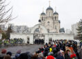People gather outside the Soothe My Sorrows church as they wait for a funeral service and a farewell ceremony for Russian opposition politician Alexei Navalny in Moscow, Russia, March 1, 2024. REUTERS/Stringer