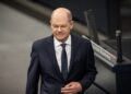 13 March 2024, Berlin: German Chancellor Olaf Scholz arrives for the questioning of the Federal Government in the plenary chamber of the German Bundestag. Photo: Michael Kappeler/dpa