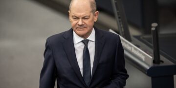 13 March 2024, Berlin: German Chancellor Olaf Scholz arrives for the questioning of the Federal Government in the plenary chamber of the German Bundestag. Photo: Michael Kappeler/dpa