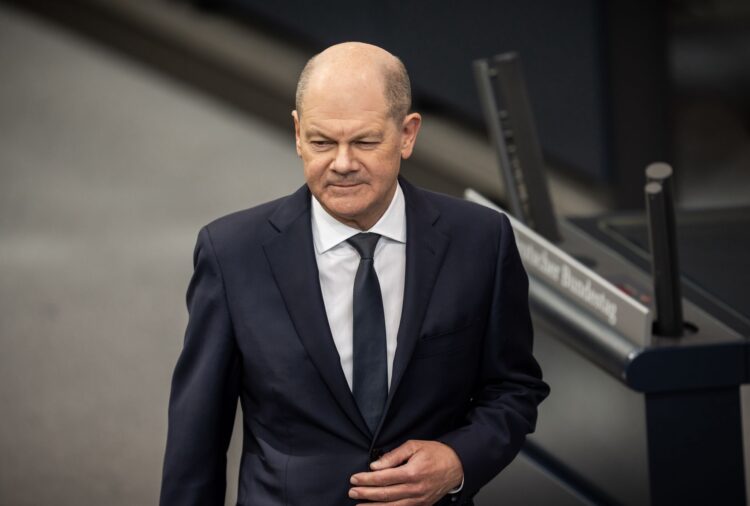 13 March 2024, Berlin: German Chancellor Olaf Scholz arrives for the questioning of the Federal Government in the plenary chamber of the German Bundestag. Photo: Michael Kappeler/dpa