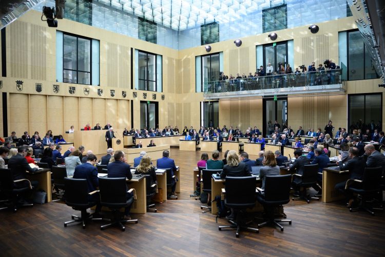 Winfried Kretschmann, Minister President of Baden-Württemberg, speaks at the plenary session of the German Bundesrat. During its session, the chamber of the federal states will discuss, among other things, the reform of the debt brake passed by the Bundestag as a prerequisite for the future federal government's planned multi-billion euro financial package for defense, infrastructure and climate protection measures. Photo: Bernd von Jutrczenka/dpa