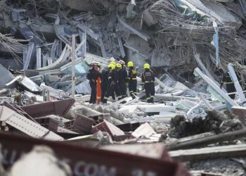 Rescuers work at the site of a high-rise building under construction that collapsed after a 7.7 magnitude earthquake in Bangkok, Thailand, Friday, March 28, 2025. (AP Photo/Sakchai Lalit)
