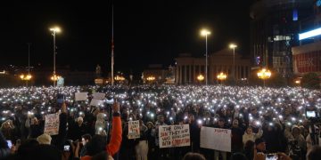 epa11972450 People hold up their phones with the light turned on during a rally for the victims who lost their lives in the Kocani night club fire, in Skopje, North Macedonia, 18 March 2025. The fire at a discotheque in Kocani in the early hours of 16 March 2025 claimed the lives of at least 59 people and left over 100 injured, according to initial reports from the Directorate for Protection and Rescue and the Center for Crisis Management.  EPA-EFE/GEORGI LICOVSKI