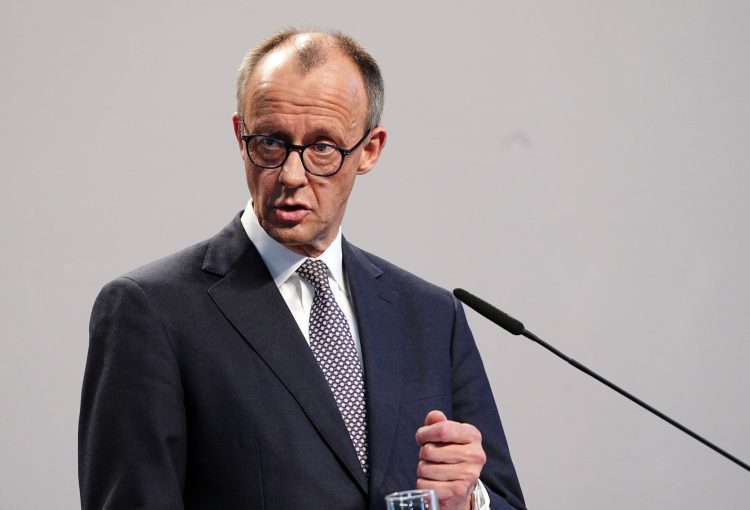 09 April 2025, Berlin: Friedrich Merz, CDU candidate for chancellor and CDU federal chairman, speaks at a press conference of the CDU/CSU and SPD party chairmen to present the coalition agreement in the Paul Loebe House. Photo: Kay Nietfeld/dpa