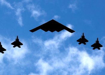 FILE PHOTO: A U.S. Air Force B-2 Spirit Stealth Bomber (C) is flanked by 4 U.S. Marine Corps F-35 fighters during a flyover of military aircraft down the Hudson River and New York Harbor past York City, and New Jersey, U.S. July 4, 2020. REUTERS/Mike Segar/File Photo