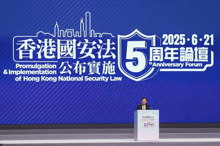 Xia Baolong, director of Hong Kong & Macao Affairs Office, speaks at the 5th anniversary of Hong Kong National Security Law Forum in Hong Kong, Saturday, June 21, 2025. (AP Photo/Chan Long Hei)