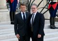 France's President Emmanuel Macron stands with Britain's Prime Minister Keir Starmer, as he arrives at the Elysee presidential palace for a meeting in Paris, France August 29, 2024. Justin Tallis/Pool via REUTERS