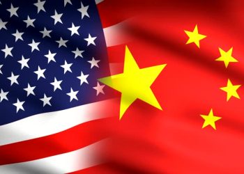 American and Chinese flag waving together