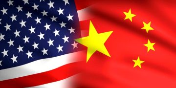 American and Chinese flag waving together
