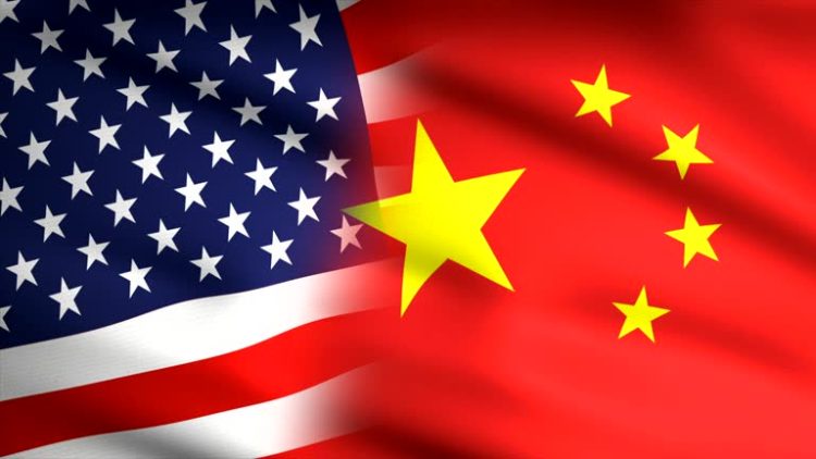 American and Chinese flag waving together
