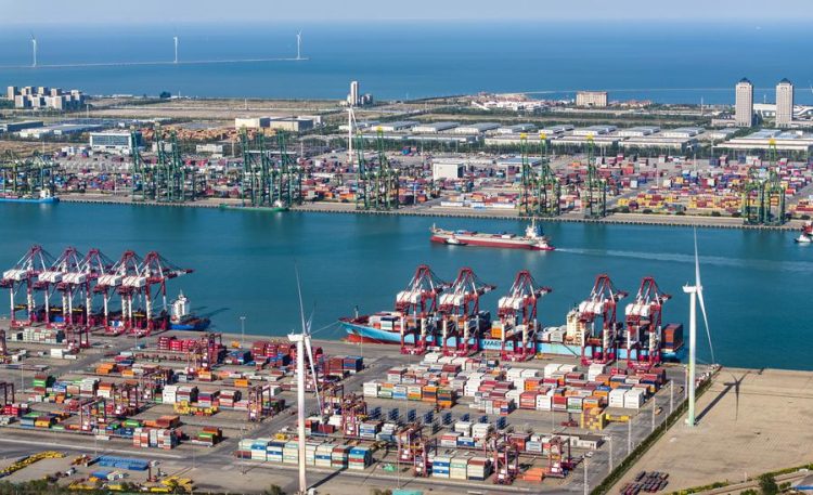 (250426) -- TIANJIN, April 26, 2025 (Xinhua) -- An aerial drone photo taken on April 25, 2025 shows a cargo ship navigating at Tianjin Port in north China's Tianjin.
  In 2025, the Tianjin Port (Group) Co., Ltd. will undertake 21 key construction projects in areas including terminal upgrading, yard expansion and reconstruction, and waterway capacity enhancement, with a total investment of approximately 19.5 billion yuan (about 2.7 billion U.S. dollars).
  In recent years, Tianjin Port has accelerated the advancement of a series of key infrastructure projects, aiming to further improve its service capabilities and to establish a high-level maritime gateway. (Xinhua/Zhao Zishuo)
