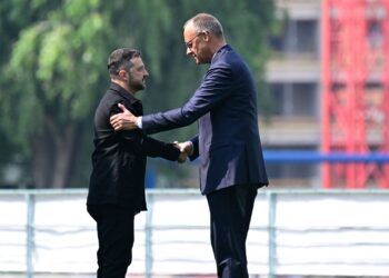 13 August 2025, Berlin: Ukrainian President Volodymyr Zelensky (L) welcomed by German Chancellor Friedrich Merz in the garden of the Federal Chancellery. Photo: John Macdougall/POOL AFP/dpa