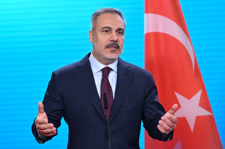 FILED - 28 November 2025, Berlin: Turkish Foreign Minister Hakan Fidan speaks at a press conference in Berlin. Photo: Soeren Stache/dpa