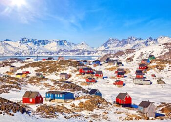 Traditional wooden houses in Kulusuk village, East Greenland