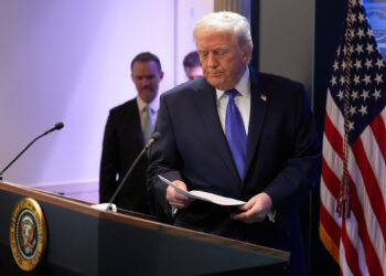 President Donald Trump walks up to the podium to speaks with reporters in the James Brady Press Briefing Room at the White House, Friday, Feb. 20, 2026, in Washington. (AP Photo/Alex Brandon)